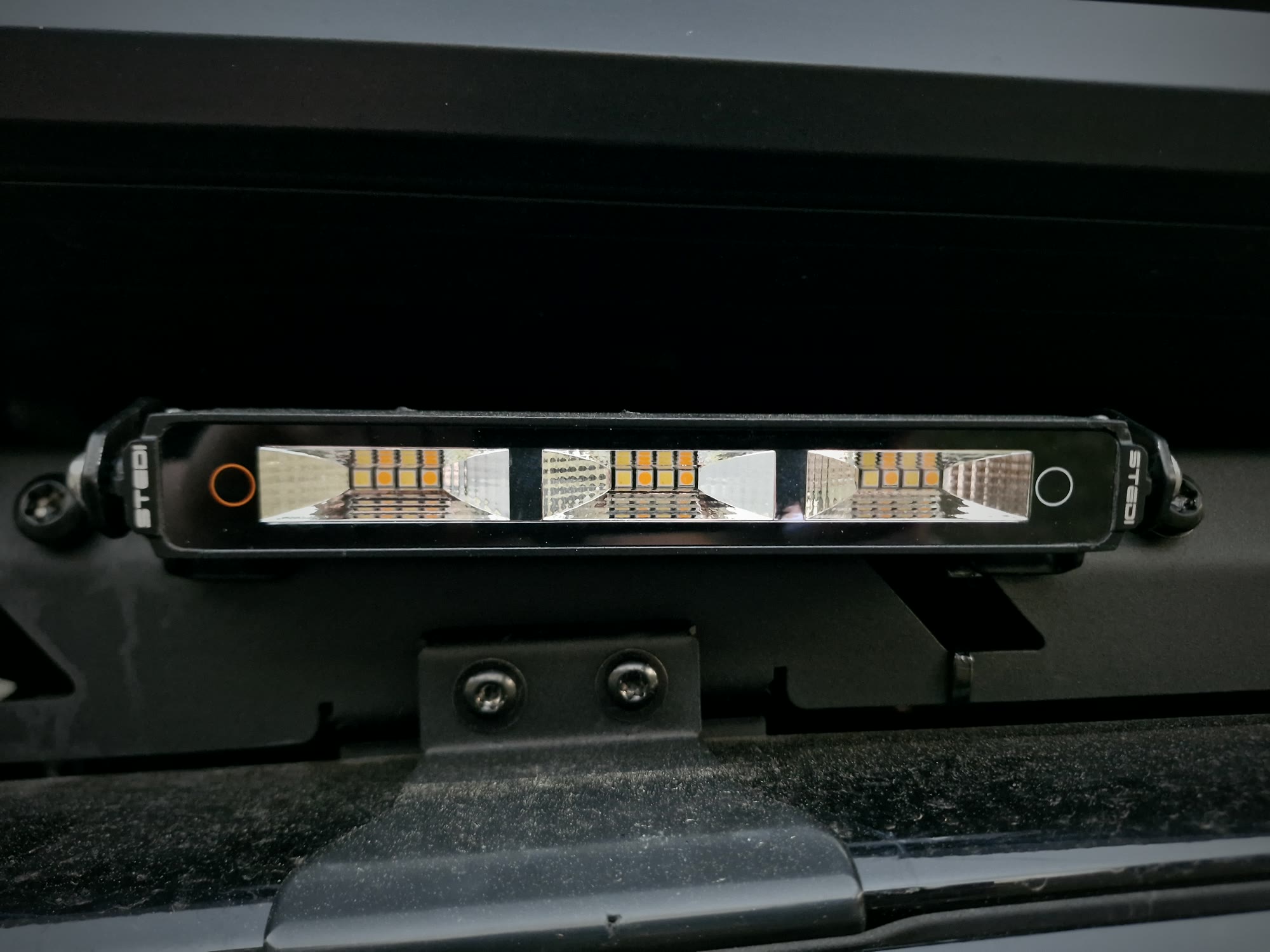 LED light bar mounted and wired on the Hilux